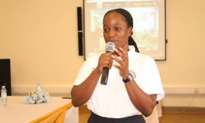Daphne Nabirye, a student with Busitema University Faculty Of Engineering making a presentation on automated digital sensing system in response to a farmer that had a concern with Monkeys in his garden. Open Access Week FOE library 20th Oct 25