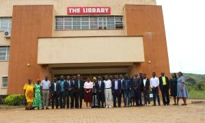 A group photo taken on Day One of the Open Access Week celebrations, featuring farmers, the University Librarian, Buistema University staff, FOE Library staff, and students, outside the Faculty of Engineering Library on 20th October 2025.