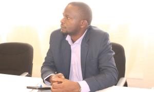 Dr. David Magumba, Senior Lecturer at Busitema University’s Faculty of Agriculture and Animal Sciences, attentively follows participant presentations during the Open Access Week celebrations at the Faculty of Engineering Library on 20th October 2025.